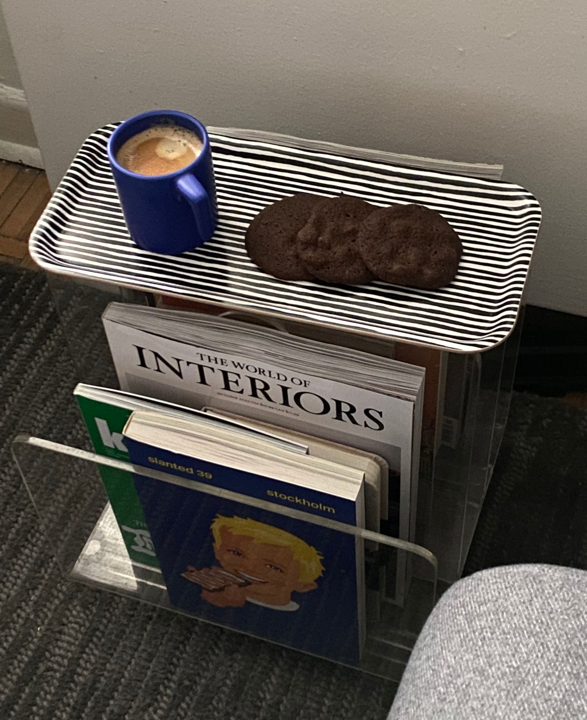 Striped Marimekko tray with cup of espresso and three cookies on it