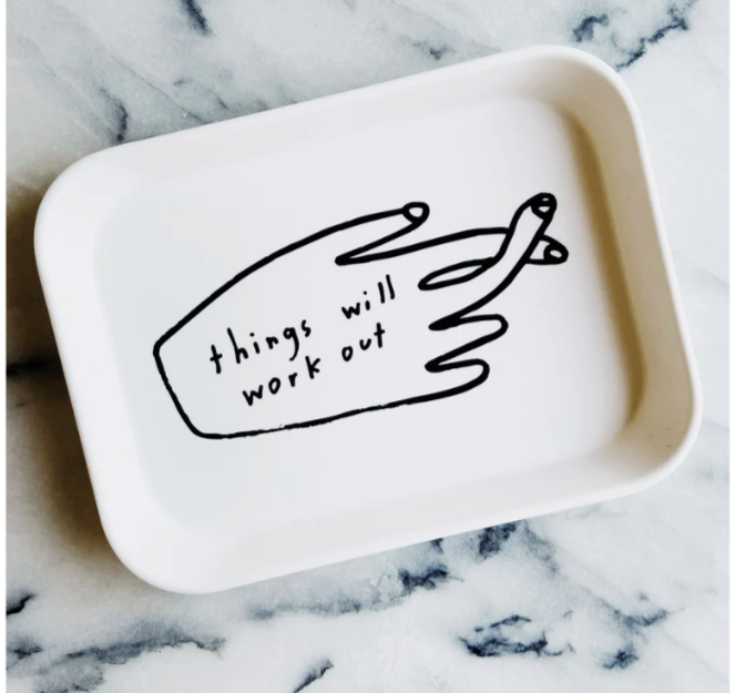 Small tray with drawing of a hand with fingers crossed and the words "things will work out"