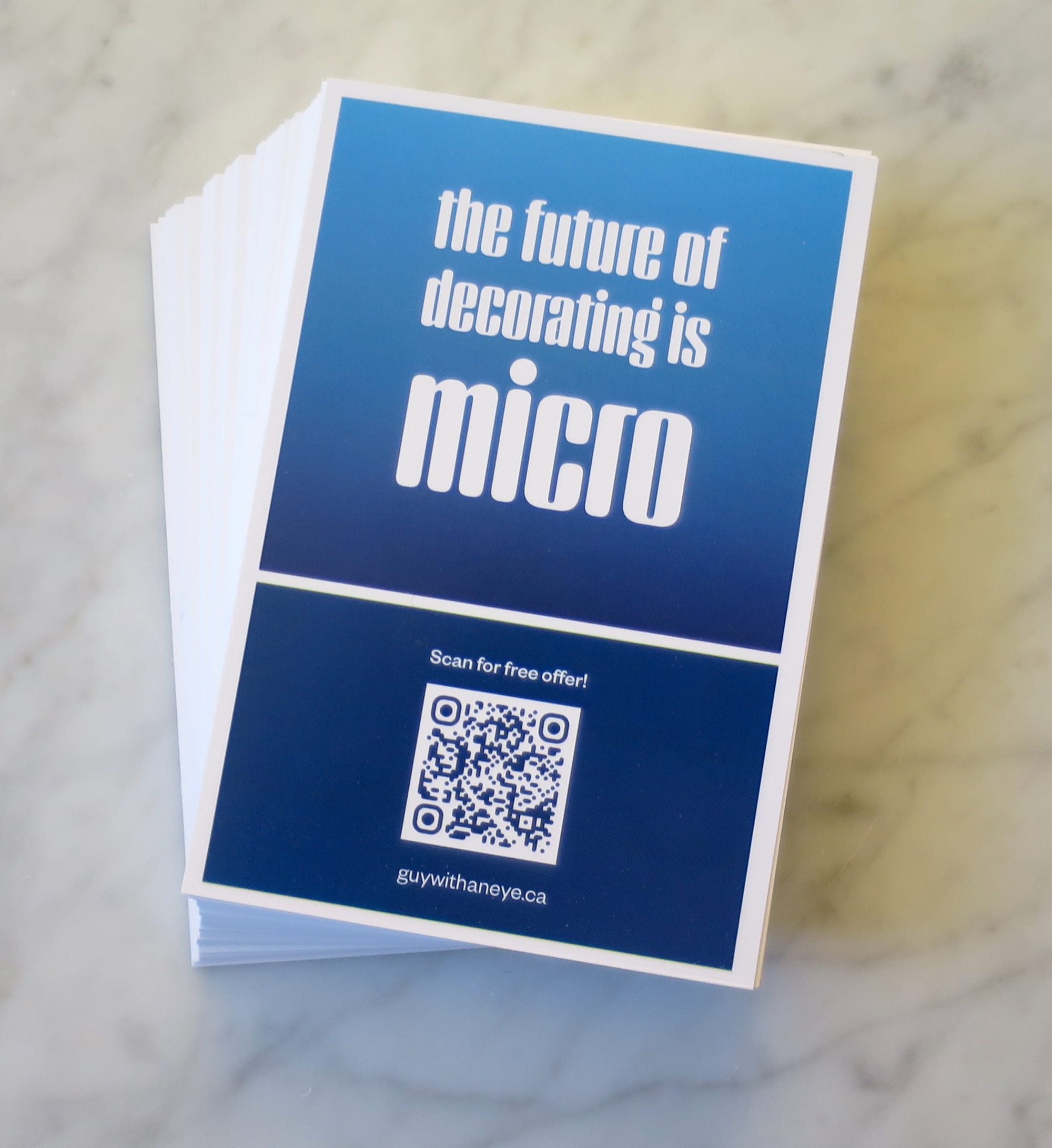 Postcard with the slogan "the future of decorating is micro" and a QR code.