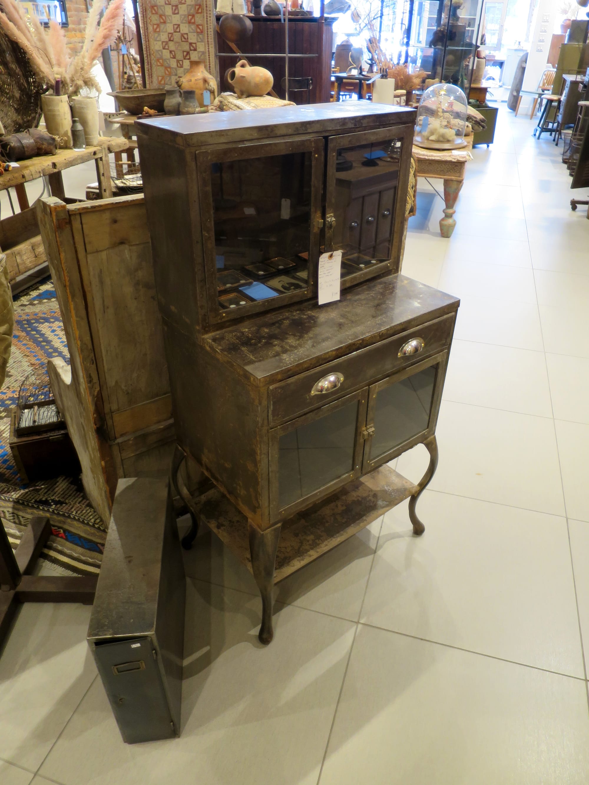 A metal cabinet with well-worn surfaces