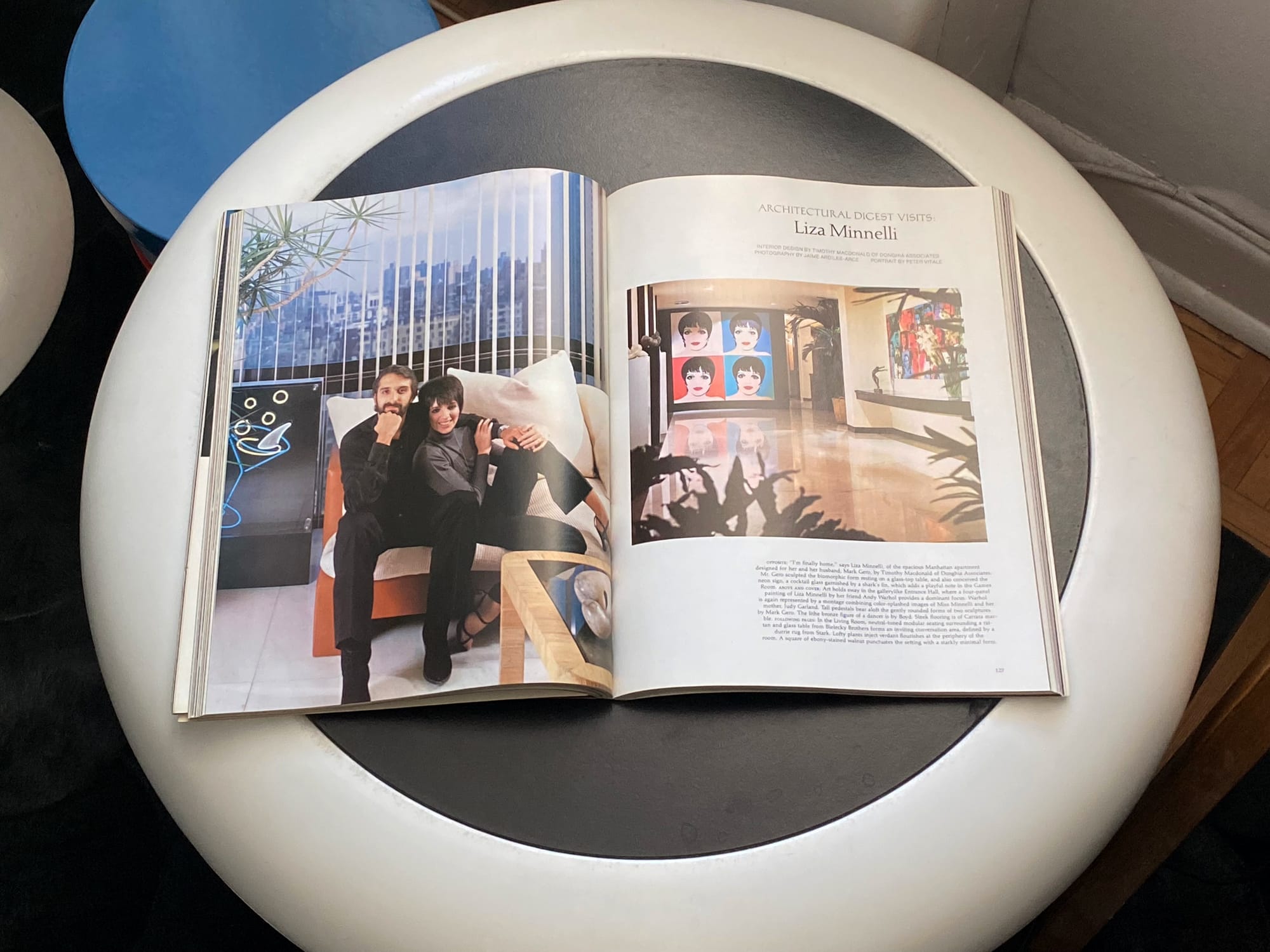 Architectural Digest open to a spread featuring Liza Minelli and her partner in their New York pad.