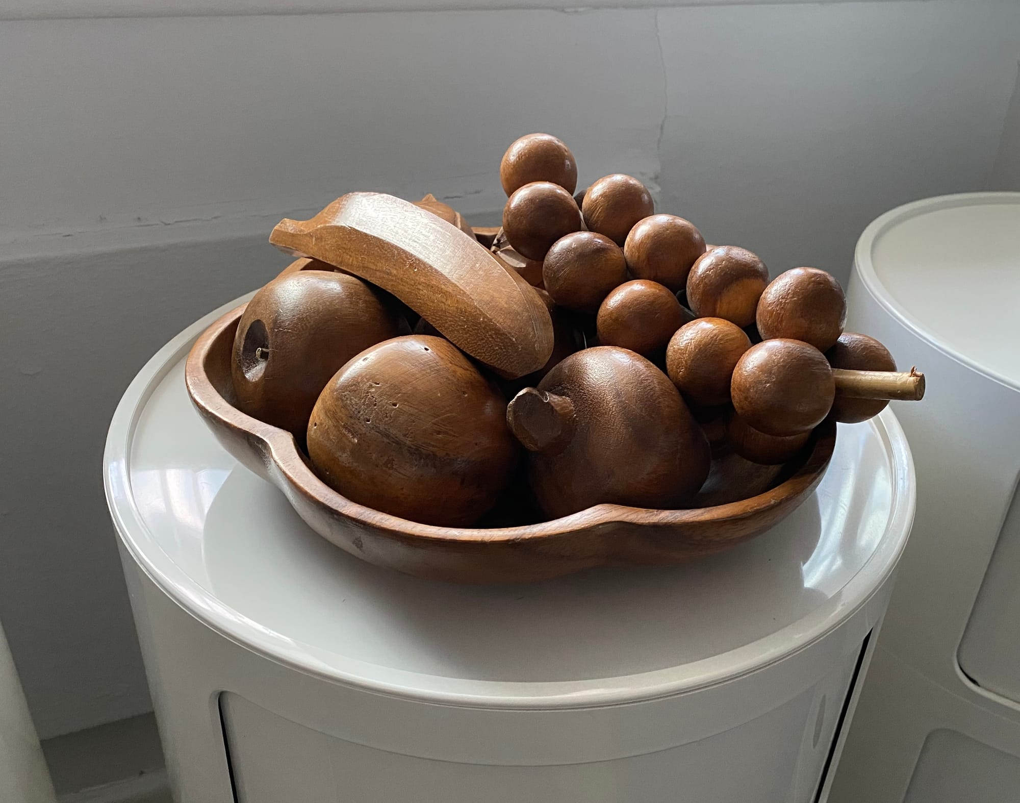 Wooden fruit in a wooden bowl