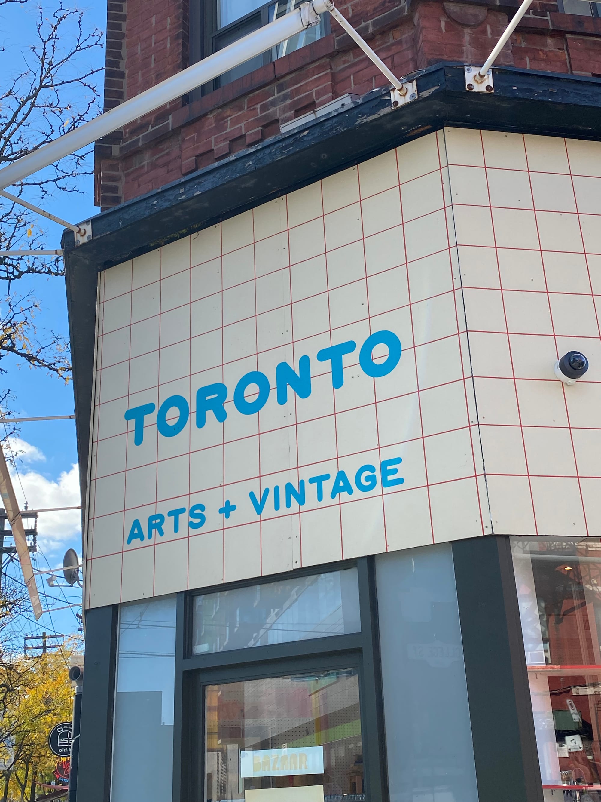 The Bazaar Toronto sign as it wraps around the corner of the building.