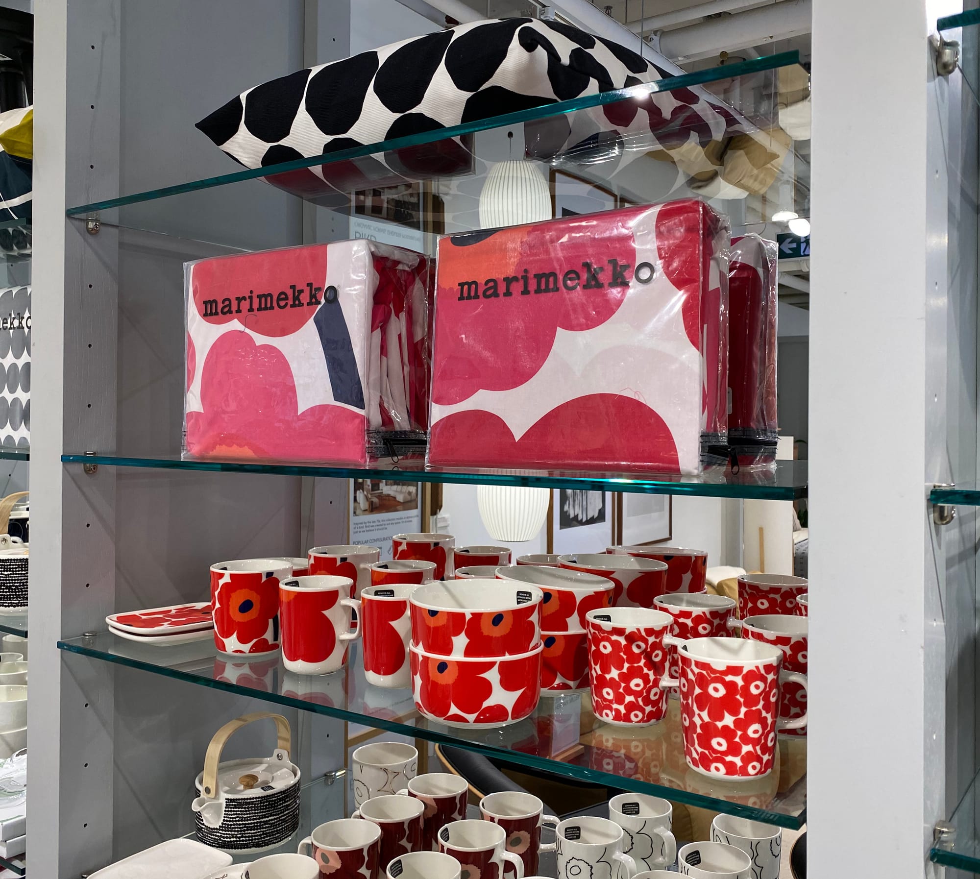 Marimekko kitchenware and bedding patterned with the Unikko poppy design.