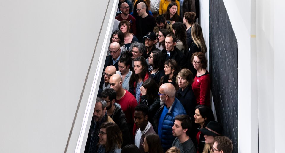 Overhead view of very crowded room